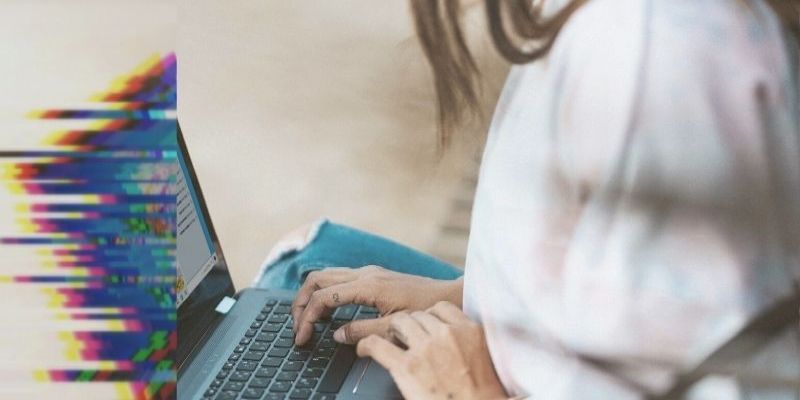 female tech expert with laptop